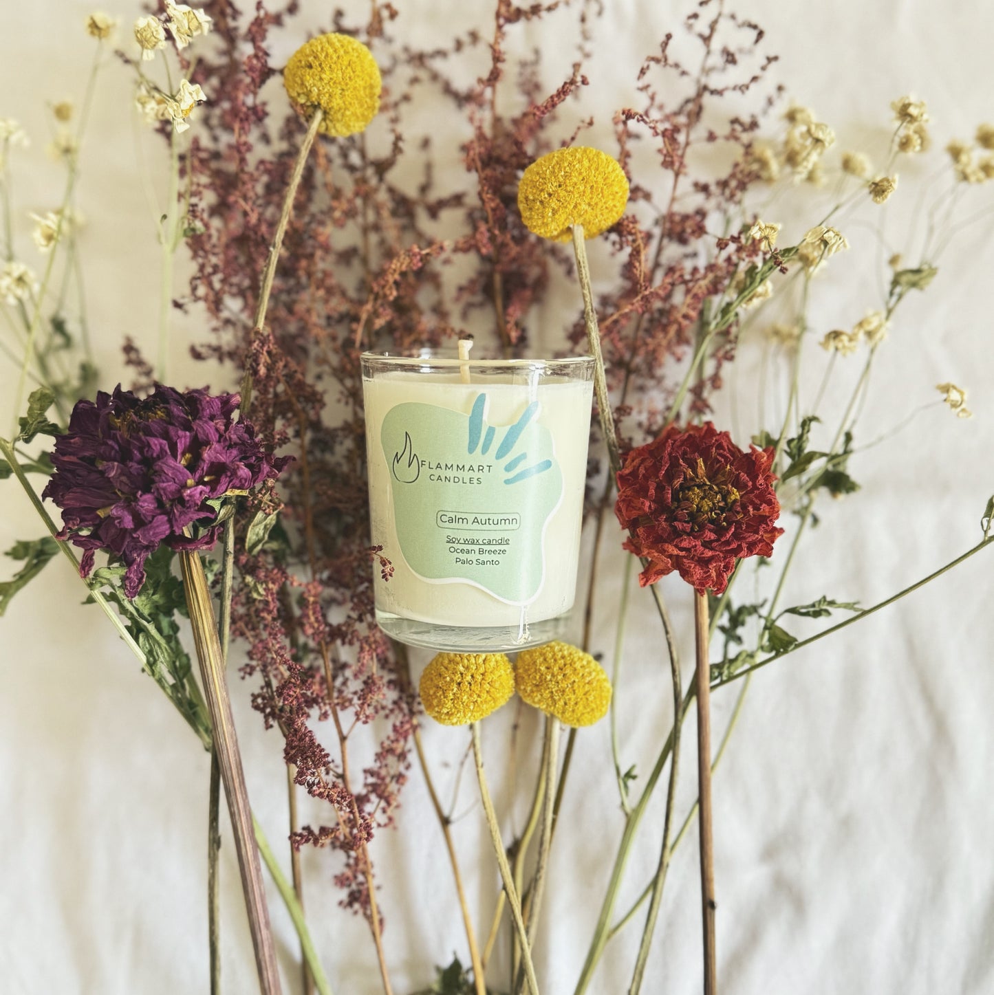 Calm Autumn candle by Flammart — double-aroma soy candle with Ocean Breeze and Palo Santo.